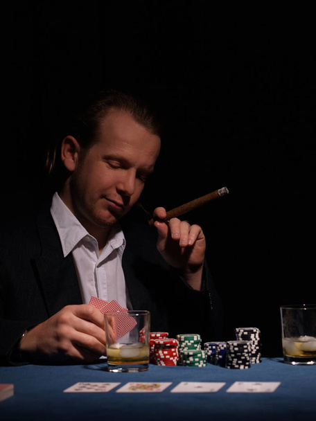 man playing cards with chips and dices - Photo, image