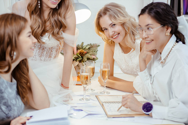 wedding, shopping concept. customers and tailor designer - Fotografie, Obrázek