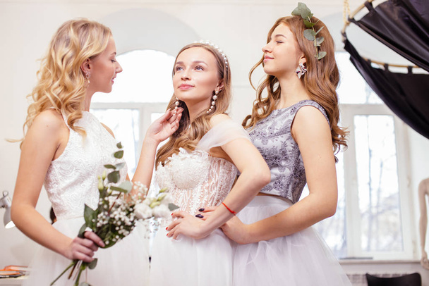 female friends together in wedding salon - Zdjęcie, obraz