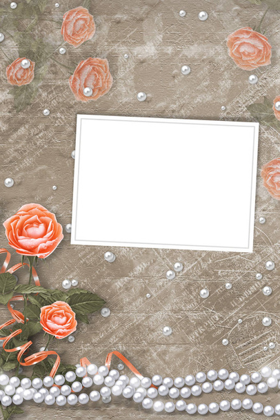 Holiday card with pearls, frame and bouquet of beautiful peach  roses on brown paper background - Foto, Imagem