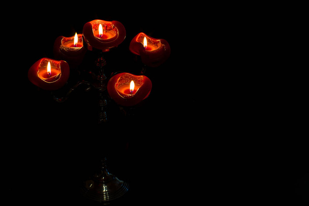 Five pillar candles on top of a candelabra. - Photo, Image