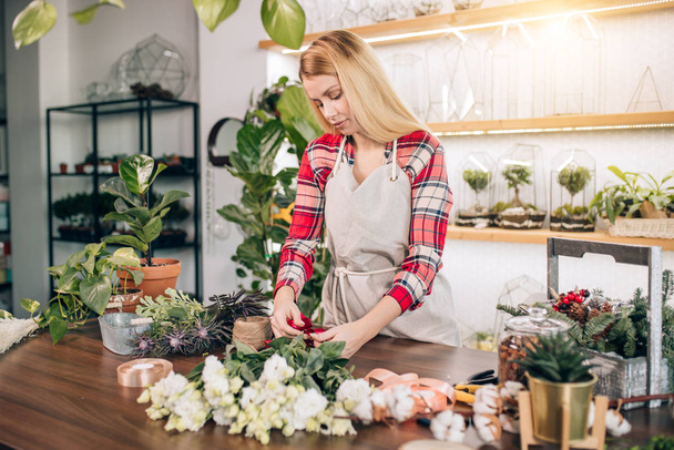 flowers lover, young florist woman look after and take care of plants - Foto, Imagem