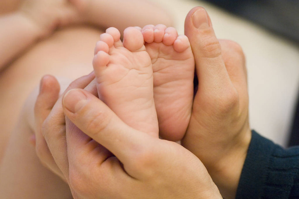 little baby legs feet, child care - Foto, Imagen