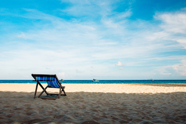 Chair on a sandy beach by the sea - Foto, Imagem