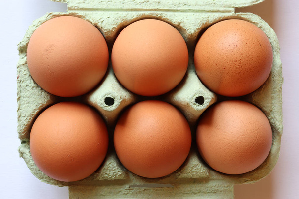 Photography of six eggs in egg carton for food illustation - Photo, Image