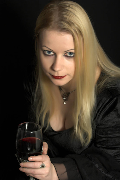 a glass of wine - Фото, изображение