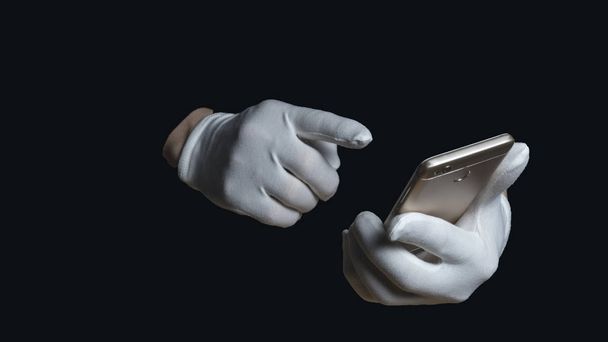 hands in white gloves on a black background. one hand holds a smartphone, the other with the index finger wants to click on the smartphone screen. on a black background - Foto, Imagem