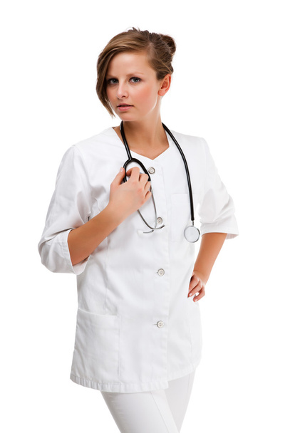 Young doctor standing isolated on white - Foto, Imagen