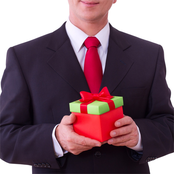 businessman holding red gift box - Zdjęcie, obraz