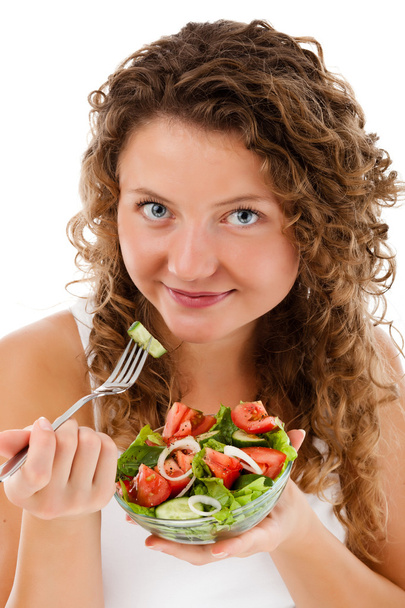 Femme mangeant une salade de légumes
 - Photo, image