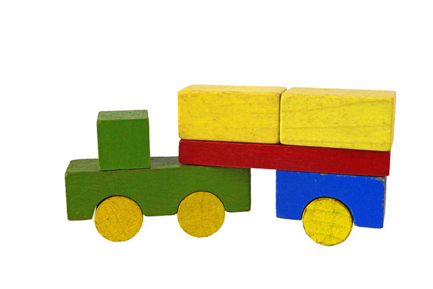 Camion of wooden blocks, traditional toy on white background - 写真・画像