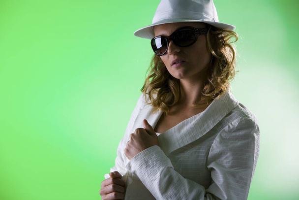 woman with white suit and hat v - 写真・画像
