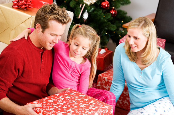 Christmas: Family Opening Christmas Presents - Фото, зображення