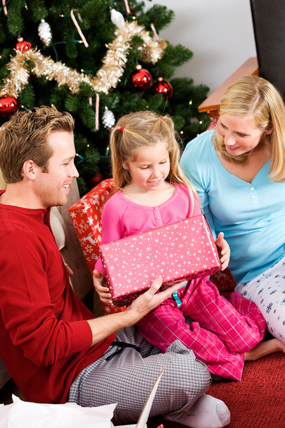 Christmas: Family Opening Christmas Presents - Фото, изображение