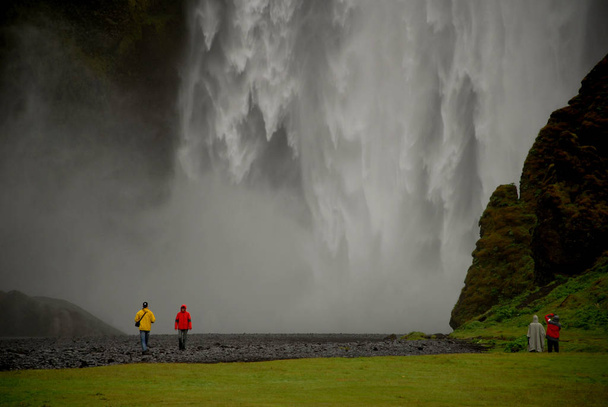 In South Island in the rain. It falls about 60m deep and is 25m wide.  - Fotó, kép