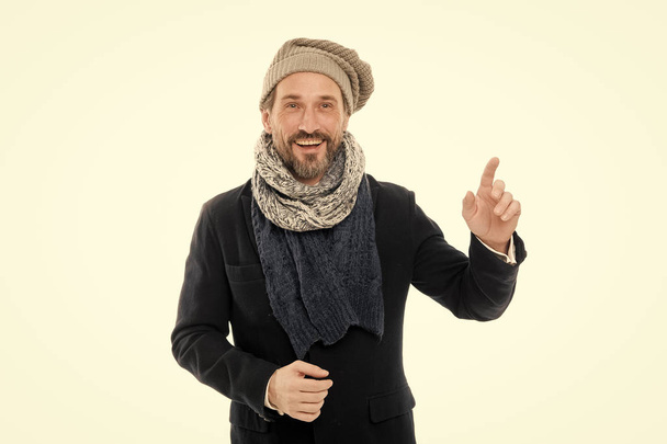 Get ready for frosty days. Mature fashion model enjoy cold weather. Bearded man accessorizing outfit with scarf. Winter wardrobe for fashionable man. Winter outfit. Feeling cozy. Winter is coming - Фото, зображення