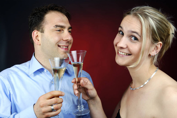 portrait of a happy couple celebrating their new year - Фото, зображення