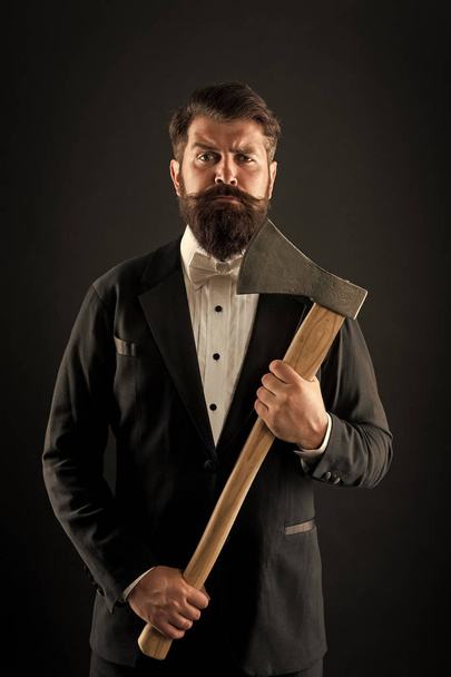 Resoluteness concept. Decision was made. Man brutal hipster with axe. Sharp ax hand confident guy. Masculinity and brutality. Barbershop hairstyle. Firm determination. Brutal barber. Brutal manners - Fotografie, Obrázek