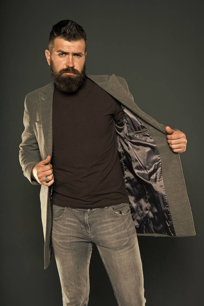 Warm jacket. Daily outfit. Fall fashion. Maintaining masculine look. Brutal hipster man. Hipster wearing casual clothes. Hipster with beard hair and stylish haircut. Bearded man trendy hipster style - Valokuva, kuva