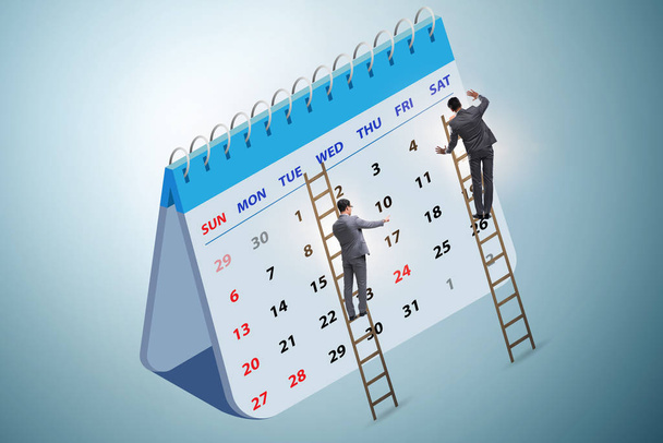 Koncepcja kalendarza biznesowego z biznesmenem - Zdjęcie, obraz