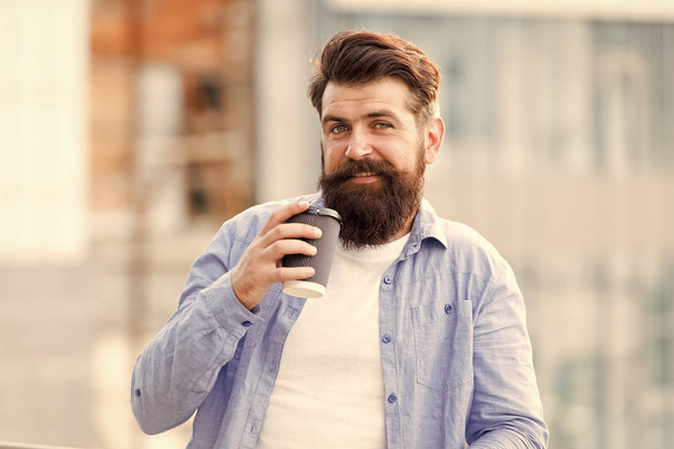 Making sip. Great ideas come from great coffee. Man drink take away coffee. Bearded man relax outdoors. Coffee break concept. Caffeine addicted. Morning coffee. Mature hipster enjoy hot beverage - Φωτογραφία, εικόνα