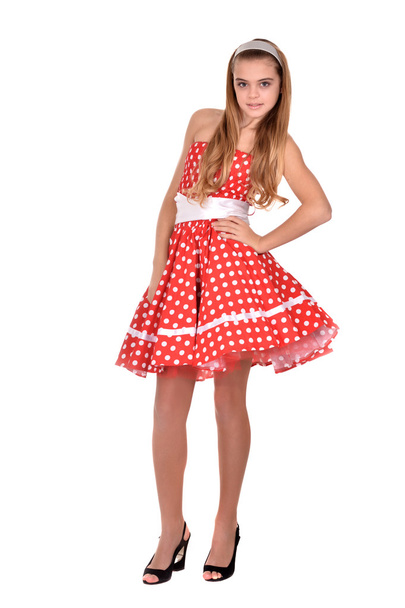 Pretty teenage girl in a red dress - Fotografie, Obrázek