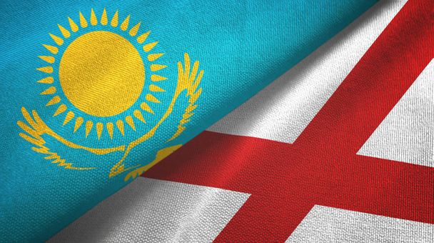 Kasachstan und Nordirland zwei Flaggen Textilstoff, Textur - Foto, Bild