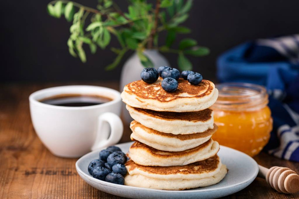 Pancakes with blueberries and honey - Photo, image