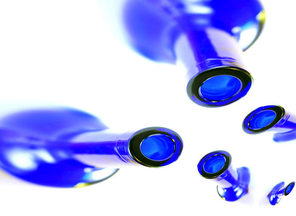 blue bottle and water drop on white background - Foto, Imagem