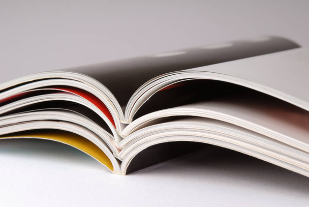 stack of magazines on a white background - Foto, immagini