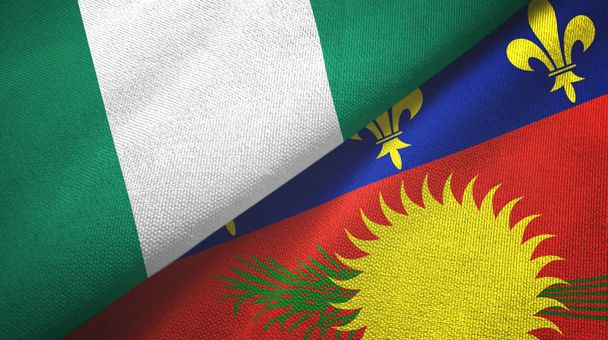 Nigeria und Guadeloupe zwei Flaggen Textilstoff, Textur - Foto, Bild