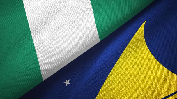 Νιγηρία και Tokelau δύο σημαίες ύφασμα, υφασμάτινη υφή - Φωτογραφία, εικόνα