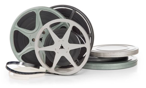 old film reel on white background - Foto, afbeelding