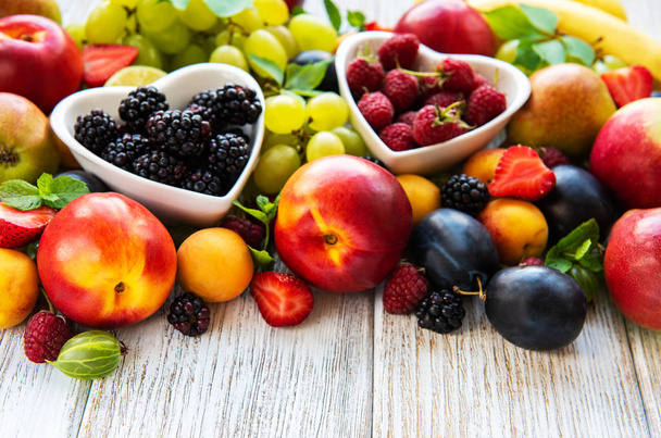 Fresh summer fruits and berries  - Фото, зображення