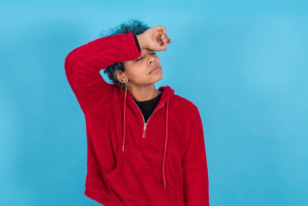 young woman or afro american girl isolated on blue background with expression - Φωτογραφία, εικόνα