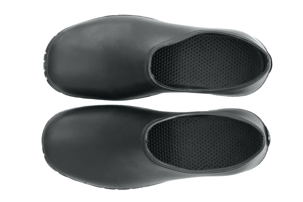 Fehér alapon izolált gumikesztyűk. Időjárásjelző kiegészítő cipőkhöz. Fényvisszaverő tok a szennyeződéstől védő cipőkhöz. - Fotó, kép