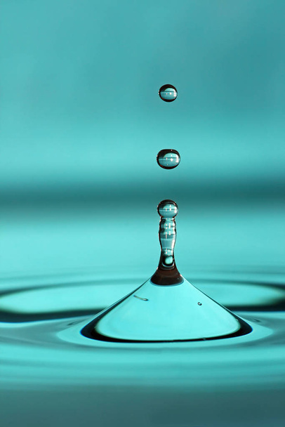 water drop on a blue background - Valokuva, kuva