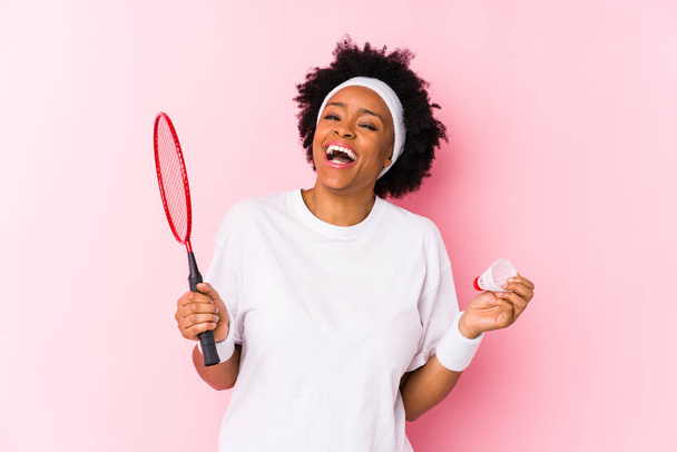 Young african american woman playing badminton - Fotografie, Obrázek