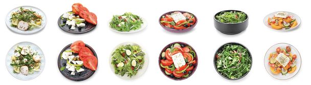Ensemble de différentes salades savoureuses sur fond blanc
 - Photo, image