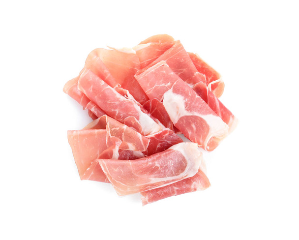 Slices of tasty prosciutto on white background, top view - Фото, зображення