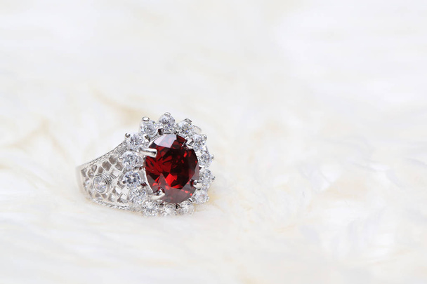 red gemstone on diamond ring , Ruby gem - Fotó, kép