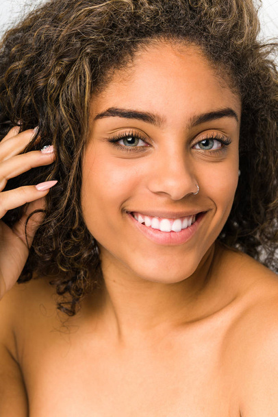 Young african american woman face closeup - Fotó, kép