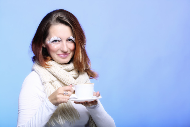 Winter makeup woman with cup of hot latte coffee - Fotoğraf, Görsel