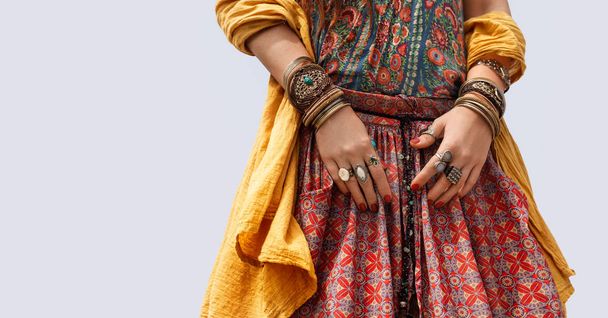 cropped image of bohemian style woman with accessories - Фото, изображение