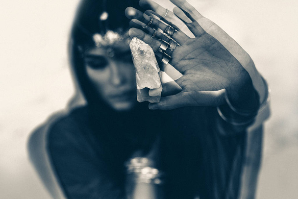 close up of woman holding magic stone. black and white.  - Foto, Bild