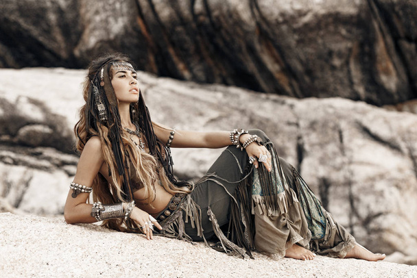 portrait of beautiful woman in native fashion concept posing to camera - Foto, immagini