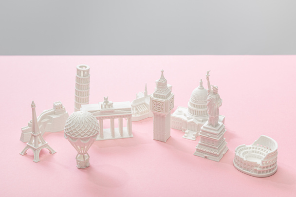 figurillas de países en rosa y gris
  - Foto, imagen
