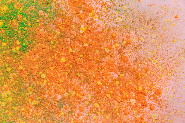 orange, yellow and green colorful holi paint explosion - Photo, Image