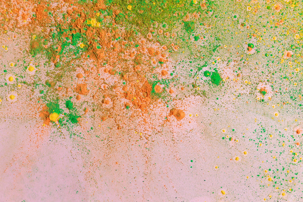 orange, yellow and green colorful holi paint explosion - Photo, Image
