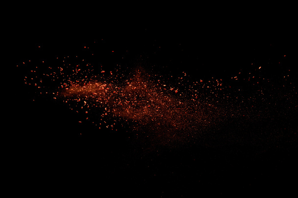 червона барвиста фарба Холі вибух на чорному фоні
 - Фото, зображення